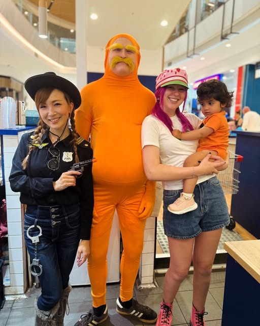 The Ariel's Dapto team dressed up for Halloween behind the counter