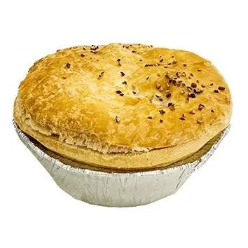 Steak pie with a golden flaky lid